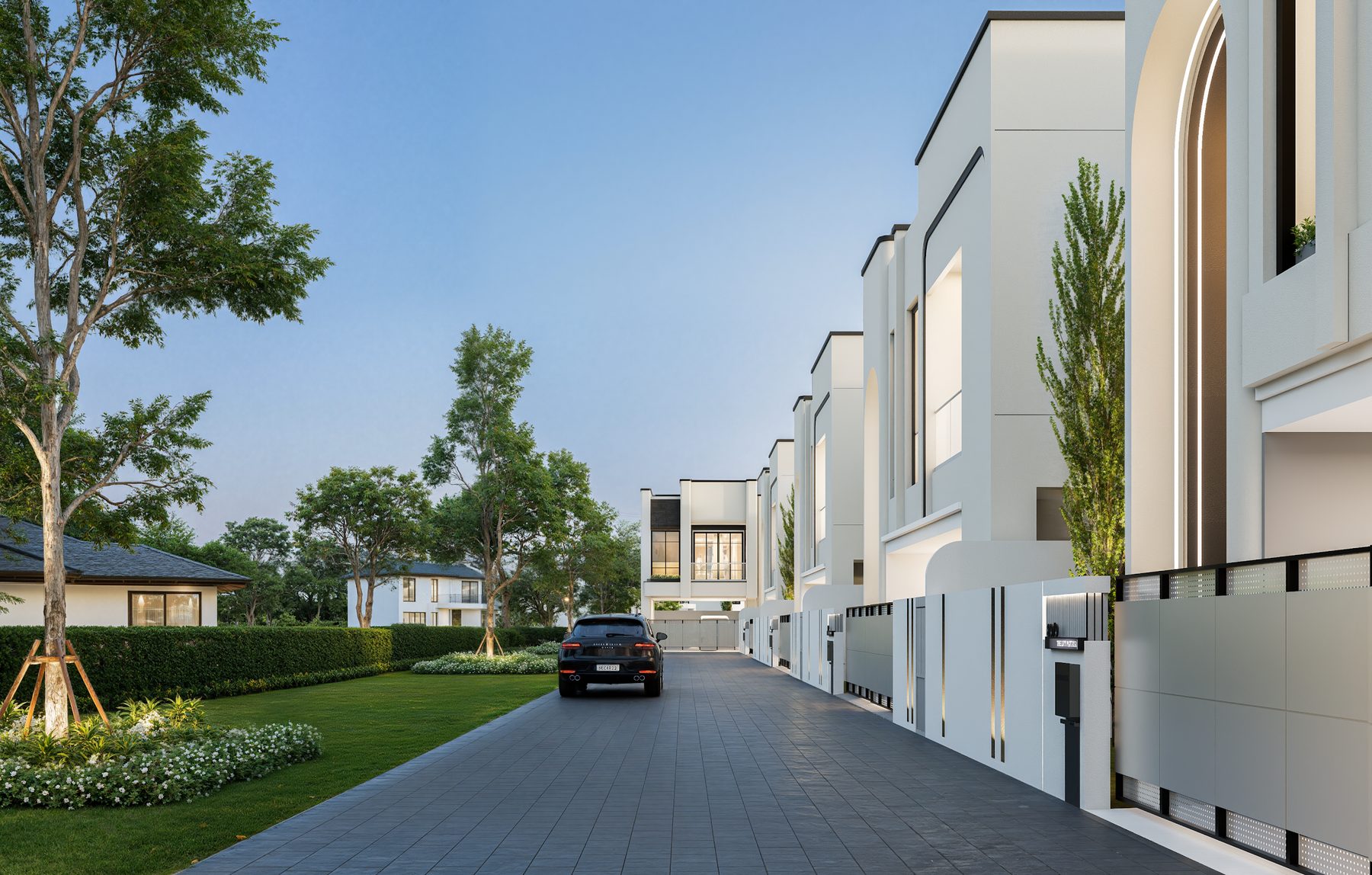 Private residential lane within The LIVV Pattaya at dusk